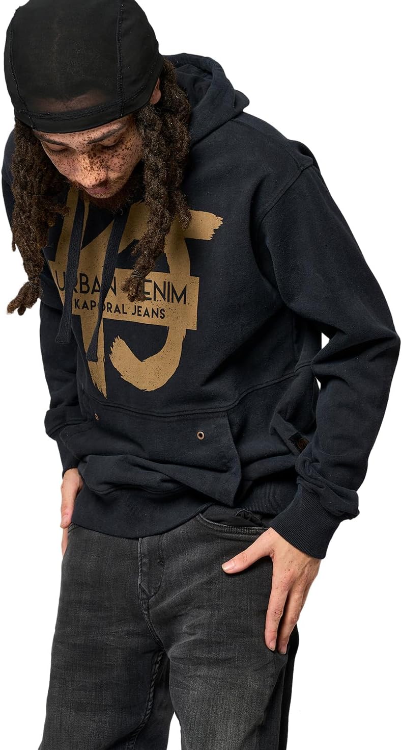 Pavo Monitor Arm installed on a wooden office desk