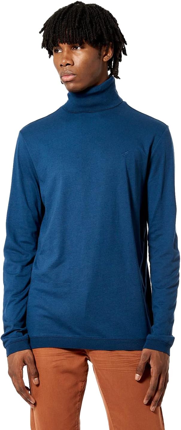 Pavo Monitor Arm installed on a wooden office desk