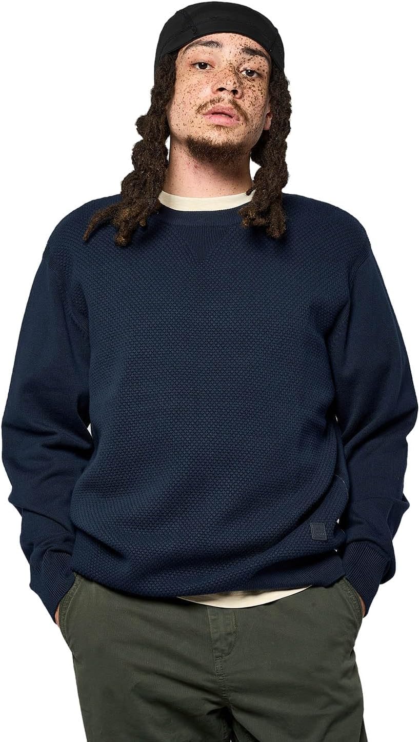 Pavo Monitor Arm installed on a modern office desk