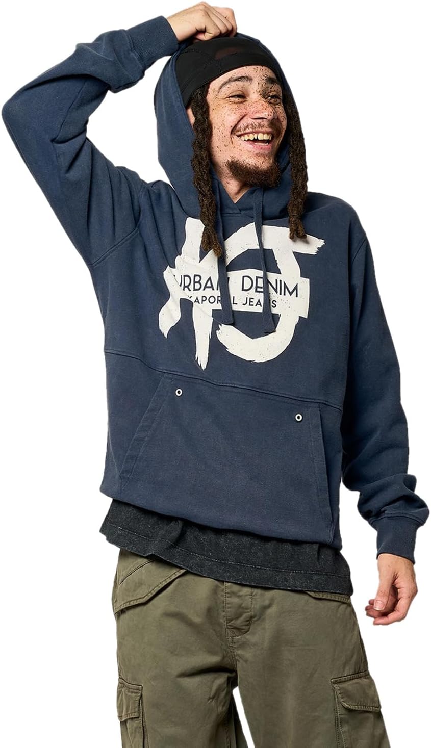 Pavo Monitor Arm installed on a wooden office desk